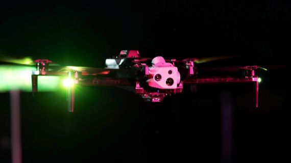 Aerospace engineers examining a prototype aircraft, symbolizing the relentless pursuit of innovation and excellence in aerospace technology